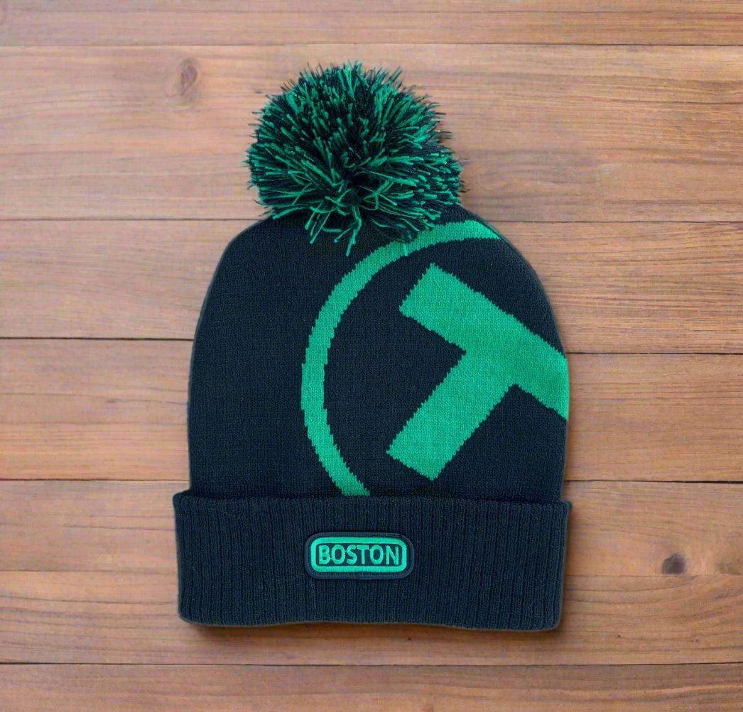Black and green adult winter pom pom hat with large MBTA T logo and Boston patch